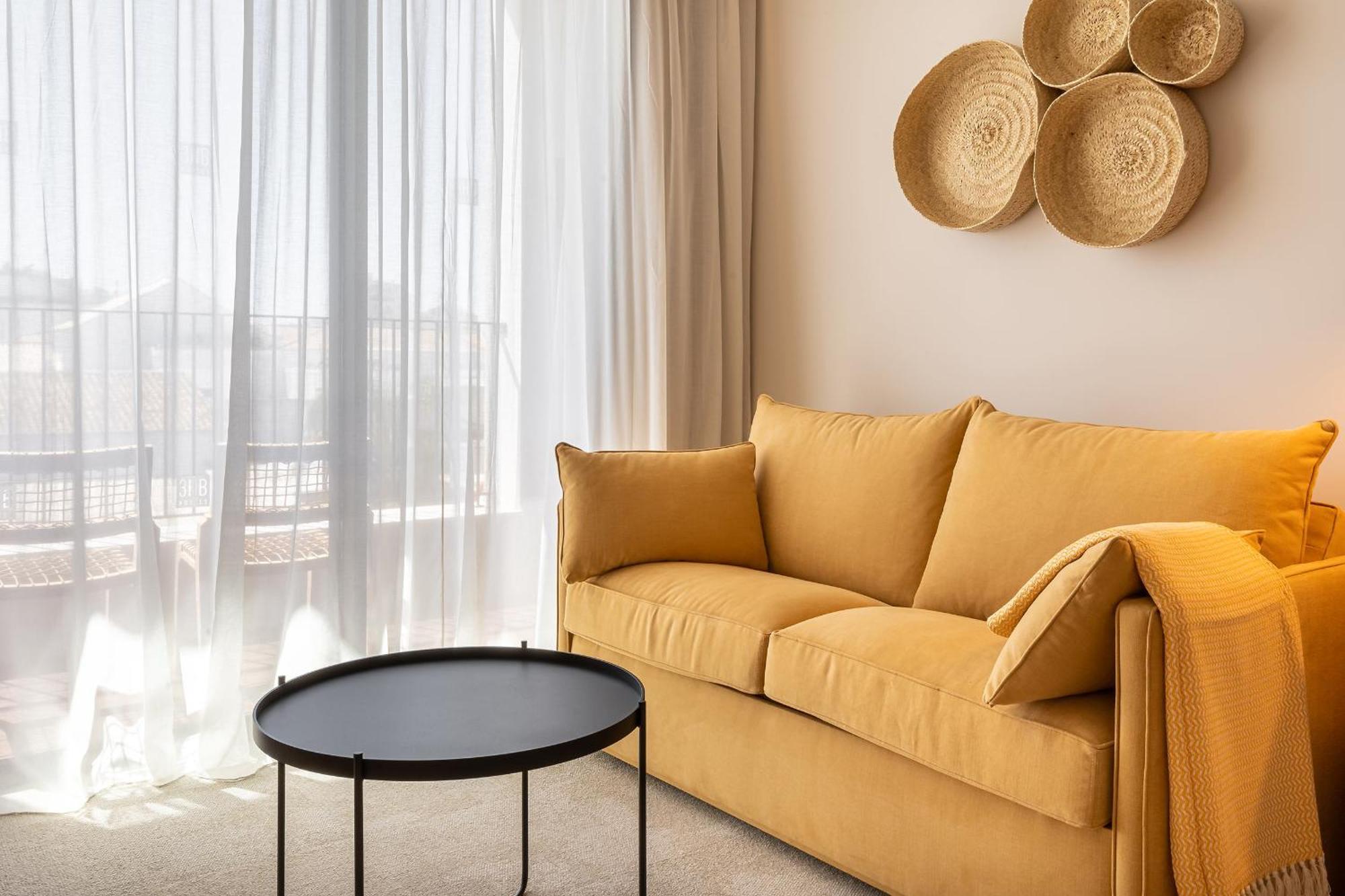 فندق 3Hb فارو الغرفة الصورة A sofa